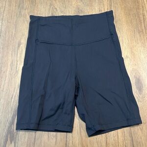 Athleta Ultimate Stash Bike Shorts with Pockets in Black